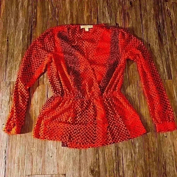 Womens Michael Kors Orange Black Print Peplum Knit Poly Top XS - Picture 1 of 4
